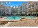Stunning pool and spa with a stone patio, inviting residents to relax and enjoy the outdoors at 1850 Cotillion Dr # 4204, Dunwoody, GA 30338