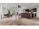 Spacious basement includes a bar, kitchen area, and seating near the windows at 2120 Blackheath Trce, Alpharetta, GA 30005