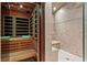 Bathroom featuring a sauna and tiled walk-in shower at 2120 Blackheath Trce, Alpharetta, GA 30005