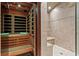Beautifully designed bathroom with a sauna and walk-in shower showcasing neutral tones at 2120 Blackheath Trce, Alpharetta, GA 30005