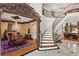 Spacious foyer with grand staircase that leads to the second floor at 2120 Blackheath Trce, Alpharetta, GA 30005