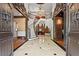 Grand foyer boasting a sweeping staircase and elegant marble flooring at 2120 Blackheath Trce, Alpharetta, GA 30005