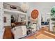 Bright and airy living room with hardwood floors, fireplace, and open floor plan at 2120 Blackheath Trce, Alpharetta, GA 30005