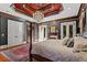 Spacious main bedroom featuring a trey ceiling, chandelier, and ample natural light at 2120 Blackheath Trce, Alpharetta, GA 30005