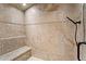 Walk-in shower with stylish tilework, a built-in bench, and modern fixtures for a spa-like experience at 2120 Blackheath Trce, Alpharetta, GA 30005
