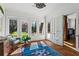Light-filled sunroom with multiple windows providing scenic outdoor views at 2120 Blackheath Trce, Alpharetta, GA 30005