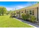 Inviting covered front porch with decorative shutters and lush landscaping at 63 Seminole Ne Rd, Cartersville, GA 30121