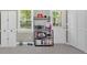 Eat in kitchen area with tile flooring, bakers rack and storage at 63 Seminole Ne Rd, Cartersville, GA 30121