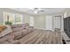 Spacious living room featuring wood-look flooring, large windows and open floor plan at 63 Seminole Ne Rd, Cartersville, GA 30121