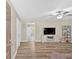 Bright living room featuring wood-look flooring and neutral paint at 63 Seminole Ne Rd, Cartersville, GA 30121