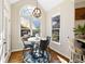 Bright breakfast nook with lots of light, with room for a table and a view of the outdoors at 720 Lakeglen Dr, Suwanee, GA 30024