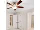 Bedroom featuring neutral walls, a ceiling fan and a closet with double doors at 8215 Majors Mill Dr, Cumming, GA 30041