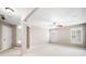 Bonus room featuring neutral carpet, light walls, and shuttered windows at 8215 Majors Mill Dr, Cumming, GA 30041