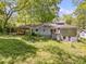 View of the backyard and rear exterior of this home at 1715 E Clifton Ne Rd, Atlanta, GA 30307