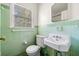 Bathroom with tiled walls, and vintage fixtures at 1715 E Clifton Ne Rd, Atlanta, GA 30307