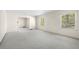 Spacious living room with neutral carpet and ample natural light from large windows at 1715 E Clifton Ne Rd, Atlanta, GA 30307