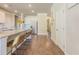 Modern kitchen featuring a large island, stainless steel appliances, and hardwood flooring at 262 Quay Dr, Lawrenceville, GA 30044