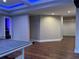 Finished basement game room featuring a ping pong table, textured wall, and blue lighting at 2818 Willowstone Dr, Duluth, GA 30096