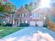 Beautiful two-story brick home featuring a well-manicured lawn and a two-car garage at 2818 Willowstone Dr, Duluth, GA 30096