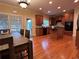 Well-lit kitchen boasts an island, wood cabinets, stainless steel appliances, and hardwood floors at 2818 Willowstone Dr, Duluth, GA 30096