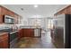 Bright kitchen with stainless steel appliances and an adjacent dining area with lots of light at 400 Mirramont Ln, Woodstock, GA 30189
