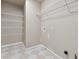 Laundry room features practical wire shelving for storage at 400 Mirramont Ln, Woodstock, GA 30189