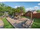 Community playground featuring wood structures, a slide, swing sets, and seating at 400 Mirramont Ln, Woodstock, GA 30189
