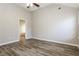 Bright bedroom features vaulted ceilings and luxury vinyl plank flooring at 7503 Garnet Dr, Jonesboro, GA 30236