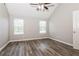 Bedroom with natural light, vinyl plank flooring, and great closet space at 7503 Garnet Dr, Jonesboro, GA 30236