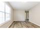 Inviting bedroom with ample natural light and modern flooring at 7503 Garnet Dr, Jonesboro, GA 30236