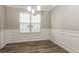 Cozy dining room with natural light, and modern flooring at 7503 Garnet Dr, Jonesboro, GA 30236