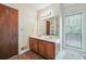 Bright bathroom features a double sink vanity and a window with privacy blinds at 1735 Little Willeo Rd, Marietta, GA 30068