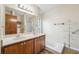 Bathroom with a double sink vanity, and a shower and bath combination at 1735 Little Willeo Rd, Marietta, GA 30068