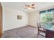 Bedroom with a window view, a ceiling fan, and a desk at 1735 Little Willeo Rd, Marietta, GA 30068