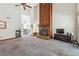 Large living room features high ceilings, a stone fireplace, and is furnished with a tv and tables at 1735 Little Willeo Rd, Marietta, GA 30068