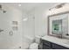 Modern bathroom with glass-enclosed shower, rain shower head, and stylish vanity at 2193 Virginia Ne Pl, Atlanta, GA 30305