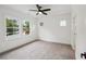 Clean bedroom with neutral carpet, three bright windows offering plenty of natural light at 2193 Virginia Ne Pl, Atlanta, GA 30305