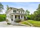 Front exterior view of home with stone columns and porch at 2193 Virginia Ne Pl, Atlanta, GA 30305
