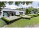 Commercial building with lush landscaping, manicured hedges, and ample parking at 2193 Virginia Ne Pl, Atlanta, GA 30305