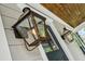 Close-up of charming exterior light fixture on front porch at 2193 Virginia Ne Pl, Atlanta, GA 30305