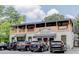 Two-story commercial building with a charming outdoor dining area and convenient parking at 2193 Virginia Ne Pl, Atlanta, GA 30305
