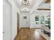 Bright, welcoming foyer that leads into the dining area with hardwood floors at 2193 Virginia Ne Pl, Atlanta, GA 30305