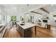 Spacious kitchen with a large island that flows into the living room with hardwood floors at 2193 Virginia Ne Pl, Atlanta, GA 30305