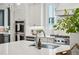 Close-up of a modern kitchen with stainless steel appliances and ample counter space at 2193 Virginia Ne Pl, Atlanta, GA 30305