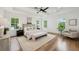 Spacious main bedroom with tray ceilings, hardwood floors, lots of natural light and neutral decor at 2193 Virginia Ne Pl, Atlanta, GA 30305