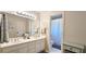 Bathroom featuring double sinks, and a separate shower at 2227 Austin Lake Se Dr, Smyrna, GA 30082