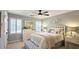 Cozy bedroom with a ceiling fan, neutral walls, and ample sunlight at 2227 Austin Lake Se Dr, Smyrna, GA 30082