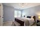 Cozy bedroom with a chandelier, neutral walls, and ample sunlight at 2227 Austin Lake Se Dr, Smyrna, GA 30082
