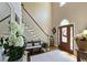 Elegant foyer with high ceilings, hardwood floors, staircase, and an inviting entryway at 2227 Austin Lake Se Dr, Smyrna, GA 30082