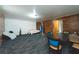 Spacious basement with wood paneling, a boxing bag, and a dining table at 275 Fern Crest Dr, Lawrenceville, GA 30046